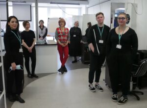 hairdressing students and staff with hairdresser Anne Veck