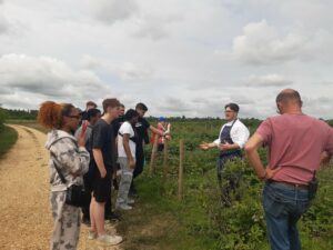 Fred Page, Head Chef, Marle, Heckfield Place gives the students a tour of the market garden and farm