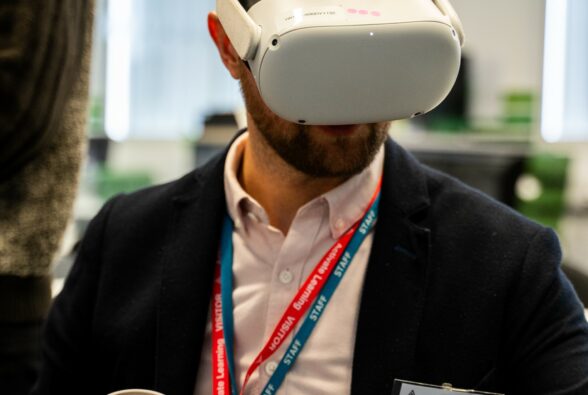 One of the attendees Roddy Peters, Group Head of Digital Skills, Windsor Forest Colleges Group tries out the VR: Early Years T Level Common Childhood Illnesses resource. 