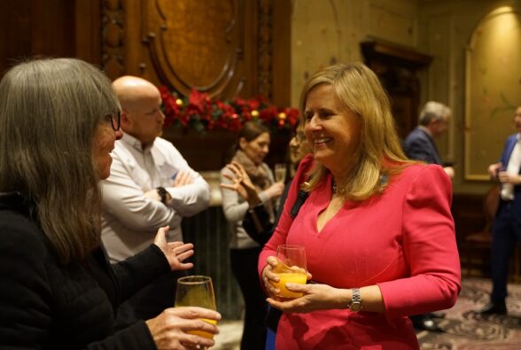 An attendee chatting to Cheri Ashby, DCEO, Activate Learning