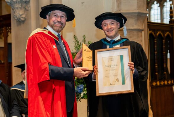 Gary Headland DL, CEO at Activate Learning, presenting a Companion Award to James Voûte, Governor at Activate Learning, to thank him for being an exceptional member of the Activate Learning Board of Governors since 2021. 
