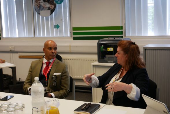 Robin Ghurbhuran from Jisc listens to Kim Blanchard, Interim Group Director of Digital Education and AI at Activate Learning